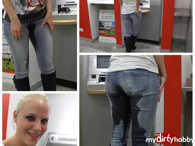 Jeans piss in front of ATM in the bank