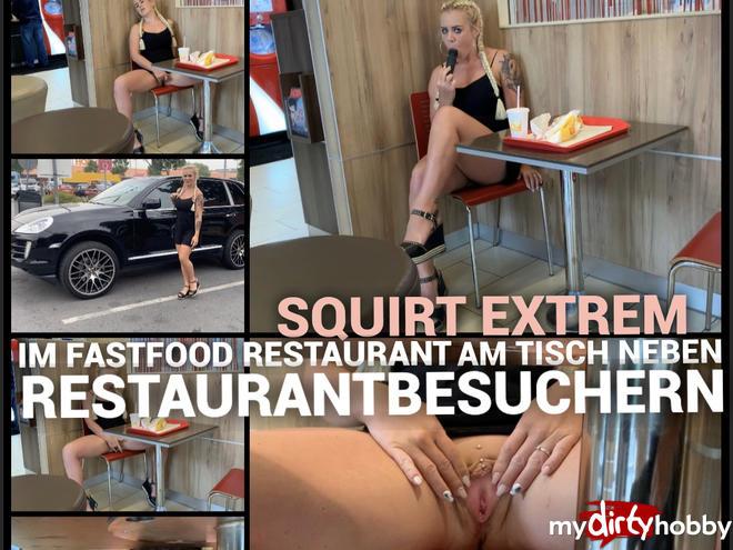 Squirt extremely - in the fast food restaurant at the table next to restaurant visitors satisfied